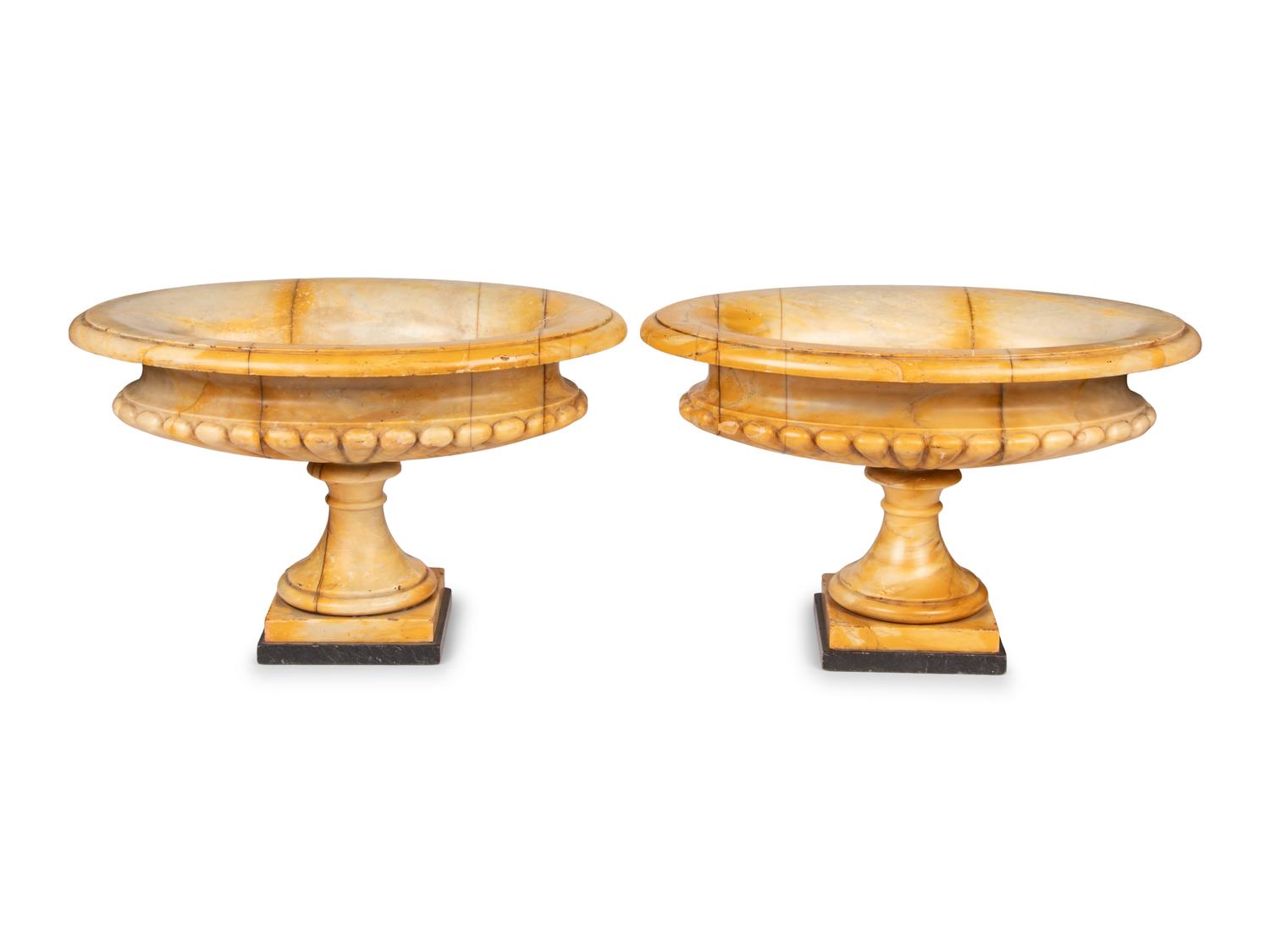A Pair of Neoclassical Style Gadrooned Sienna Marble Urns