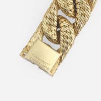 An 18K yellow gold and diamond curb link bracelet, Tiffany & Co. George L'Enfant, Paris
