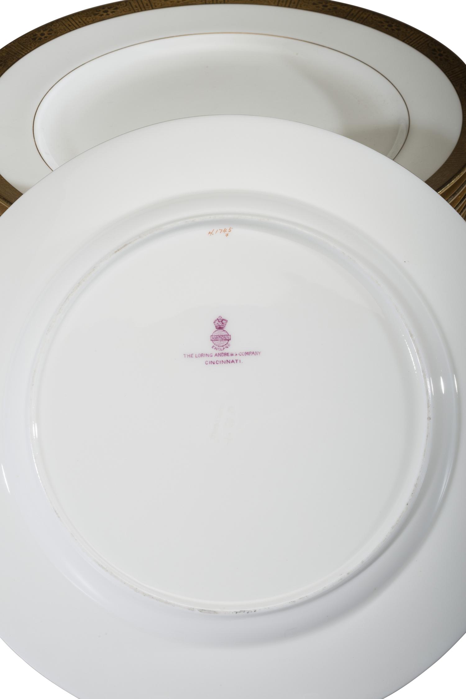 Seventeen Minton's Gilt Porcelain Plates