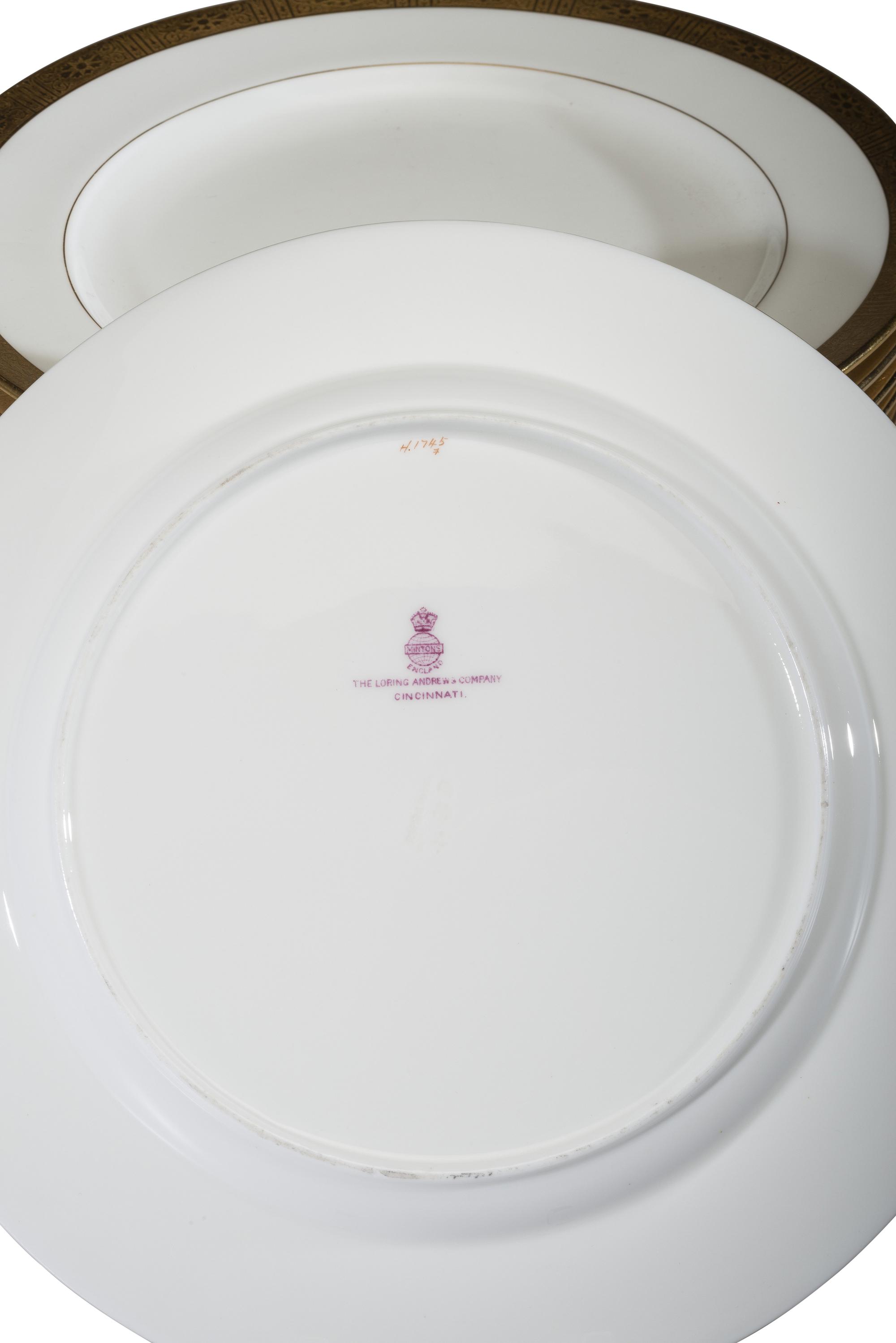 Seventeen Minton's Gilt Porcelain Plates