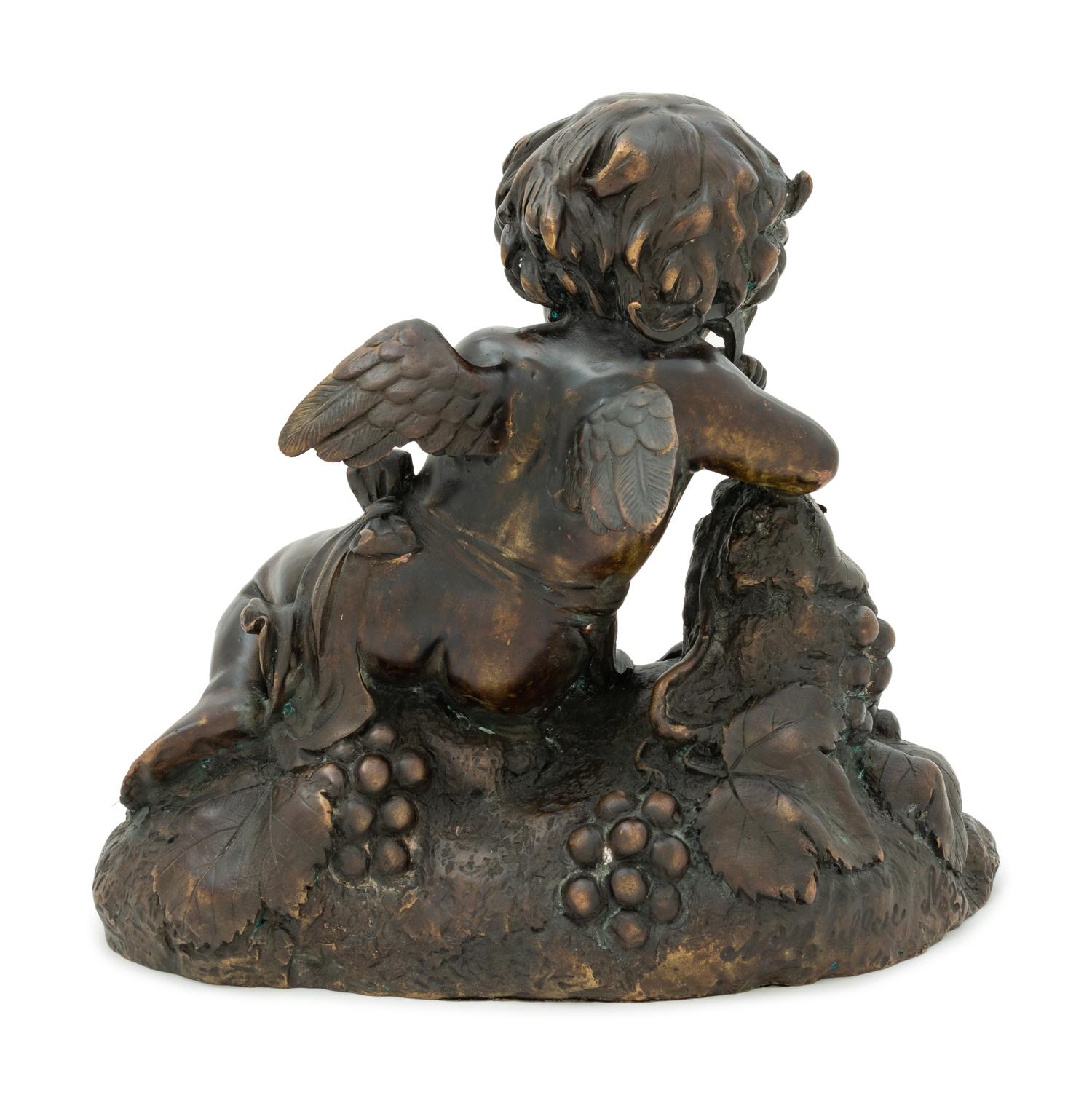 A Continental Bronze Figure of a Putto