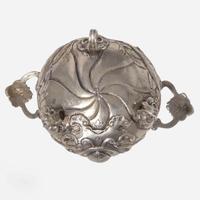 A miniature Continental silver repoussé three-piece coffee service, probably 19th century