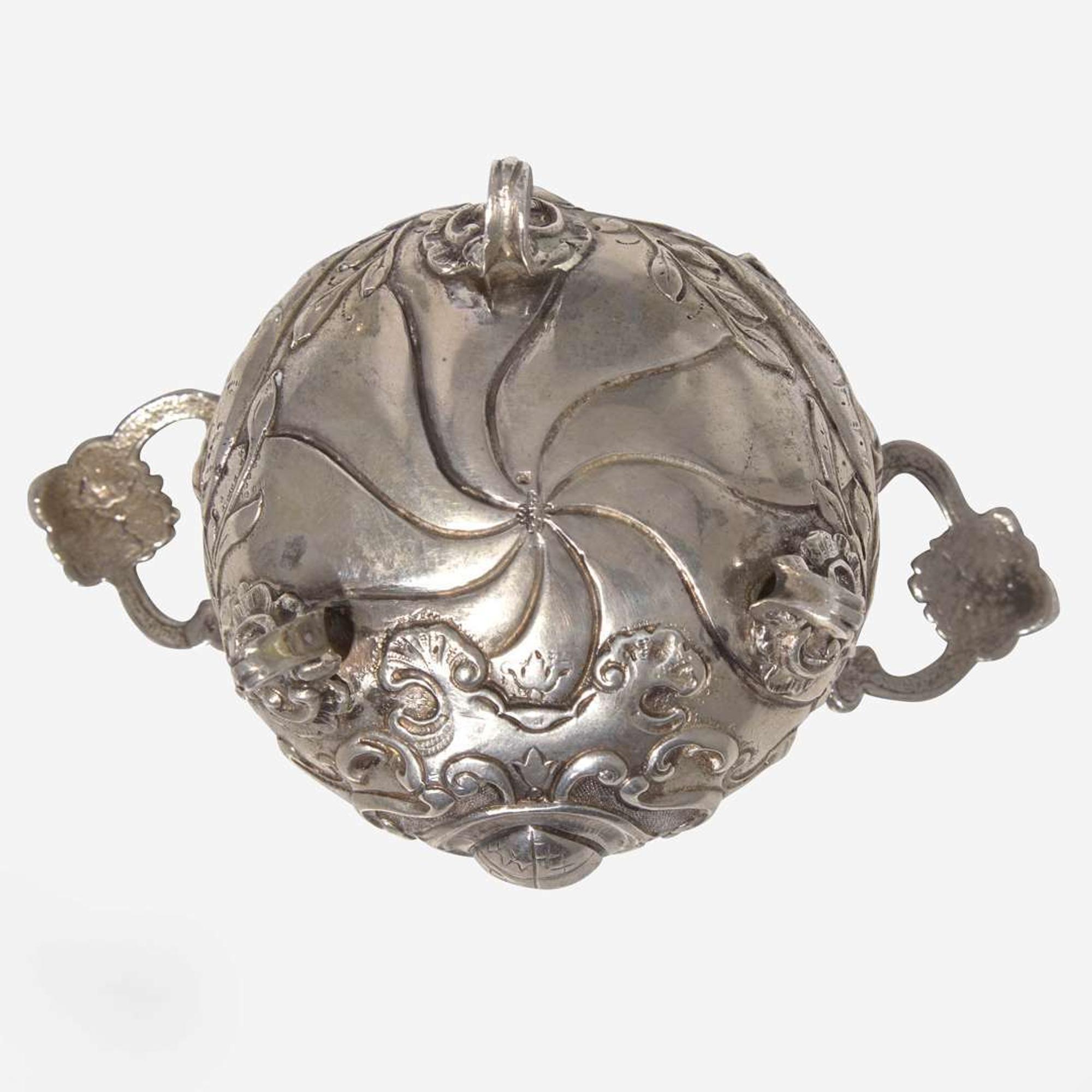 A miniature Continental silver repoussé three-piece coffee service, probably 19th century
