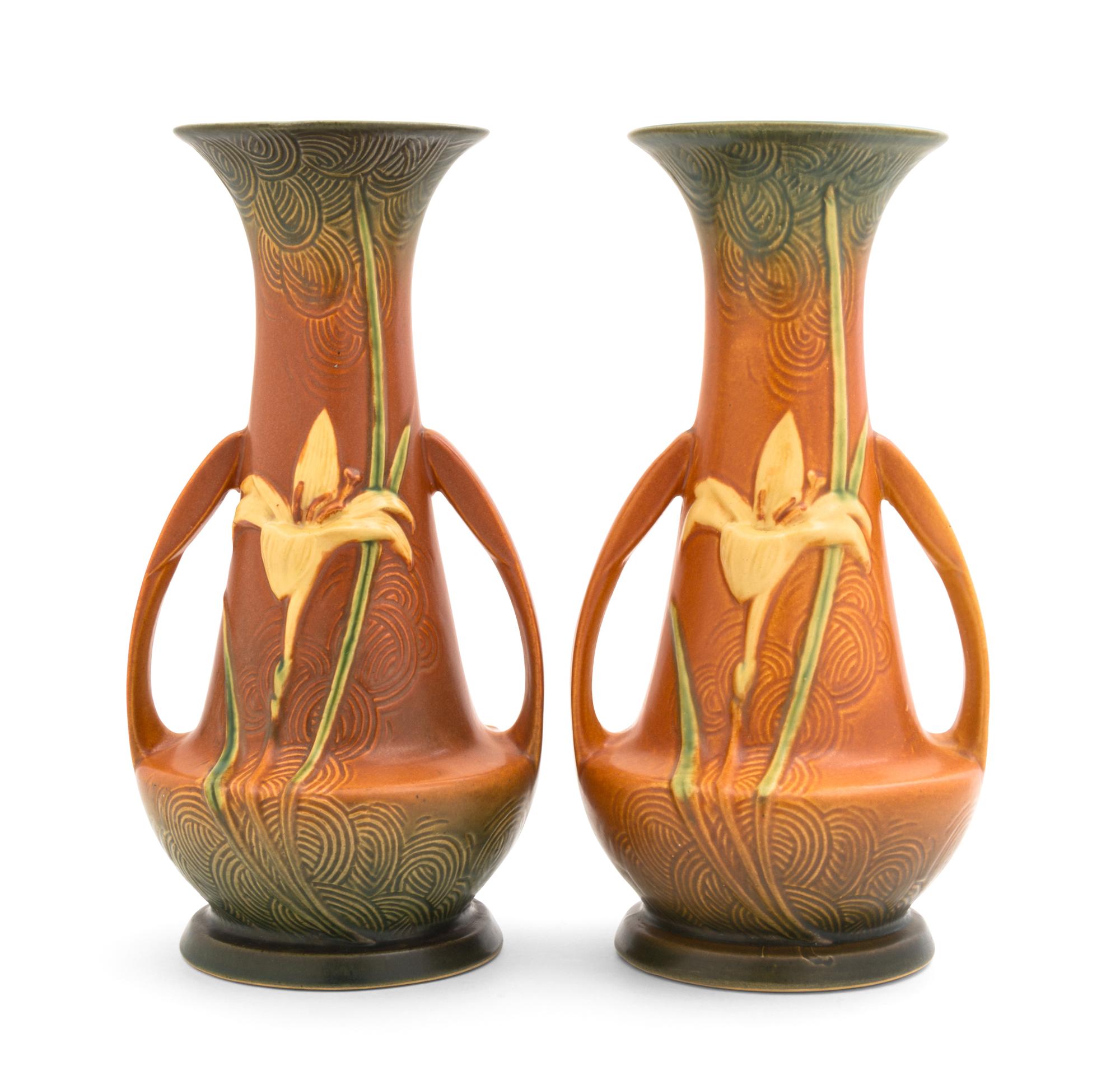 A Pair of Roseville Zephyr Lily Pottery Vases Height 12 1/4 inches.