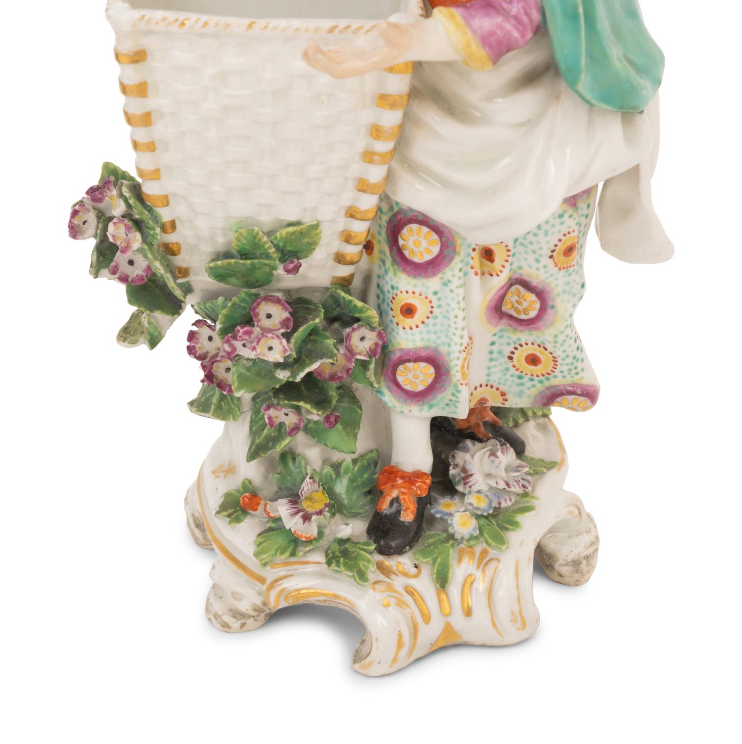 A Pair of Chelsea Porcelain Figures