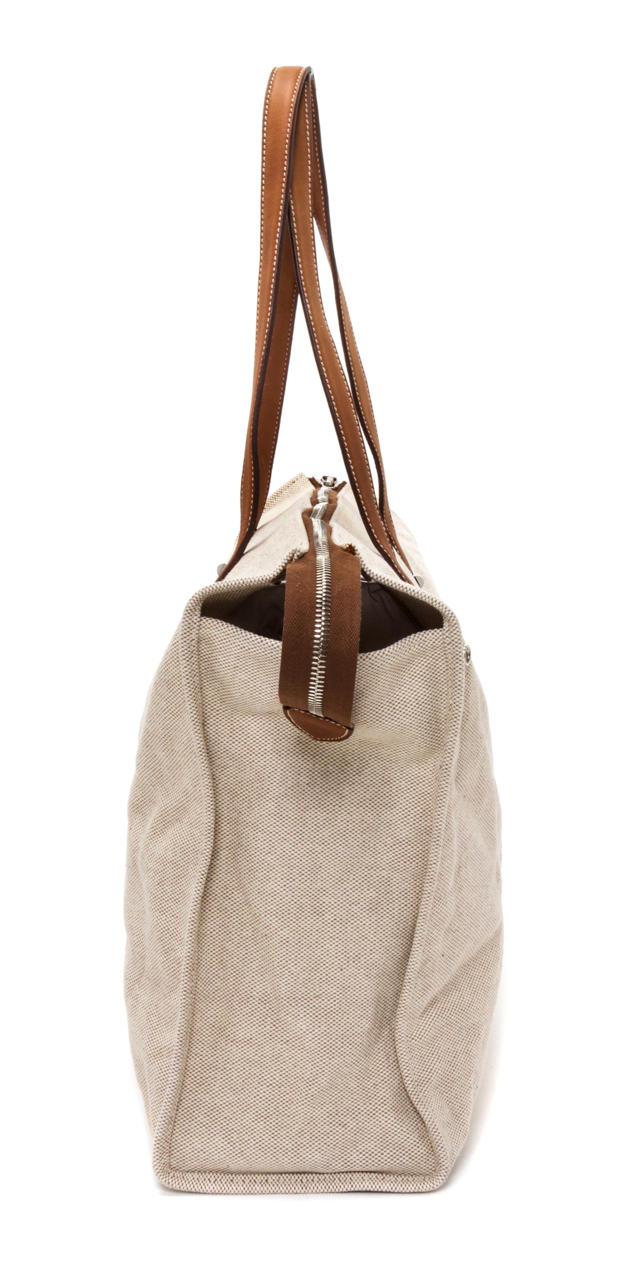 An Hermes Ecru Toile and Veau Barenia Mira Tote Bag, 14" x 14" x 5.5".