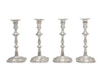 An Assembled Set Of Four George III Sterling Silver Candlesticks