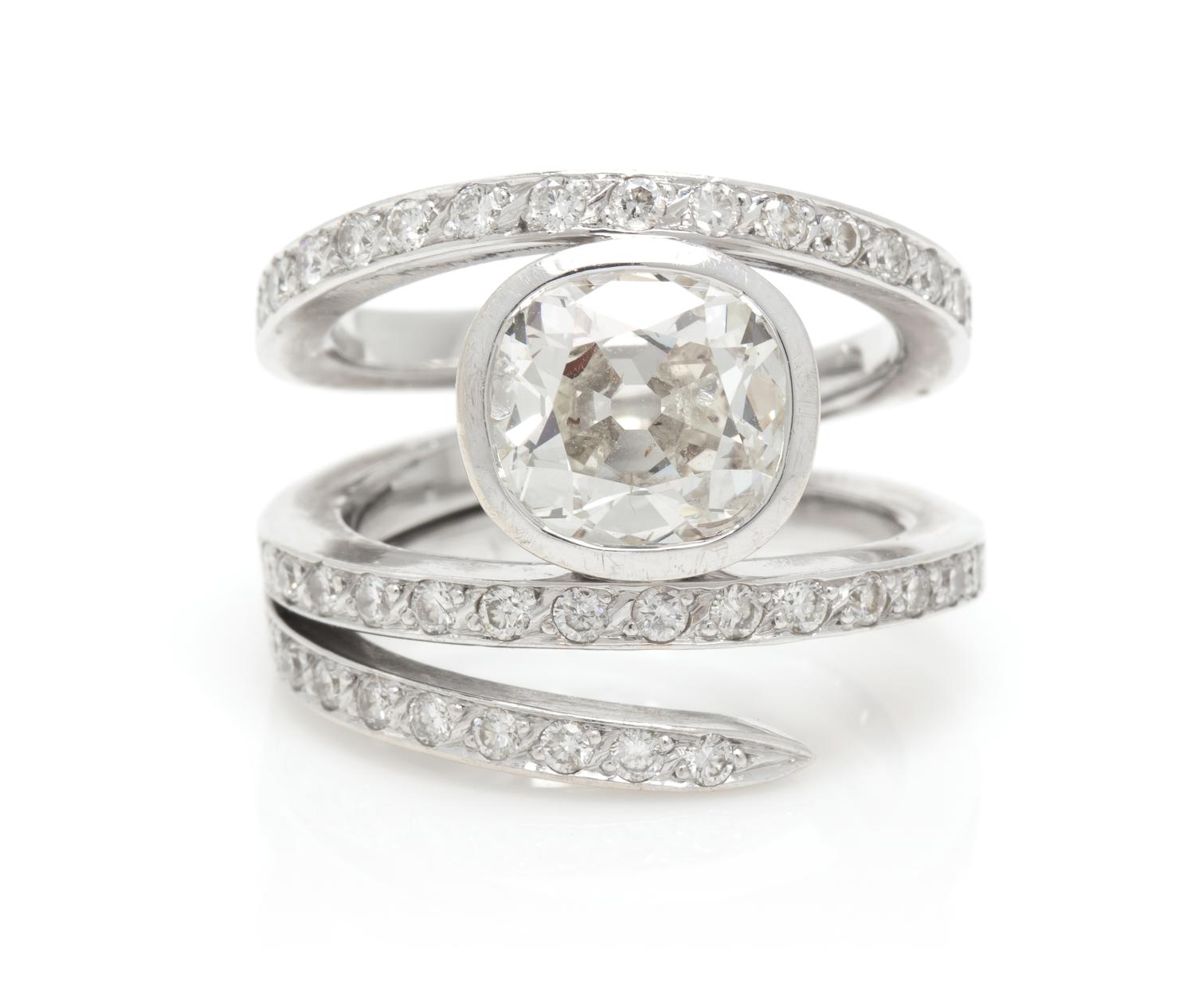 An 18 Karat White Gold and Diamond Ring, French, 10.00 dwts.