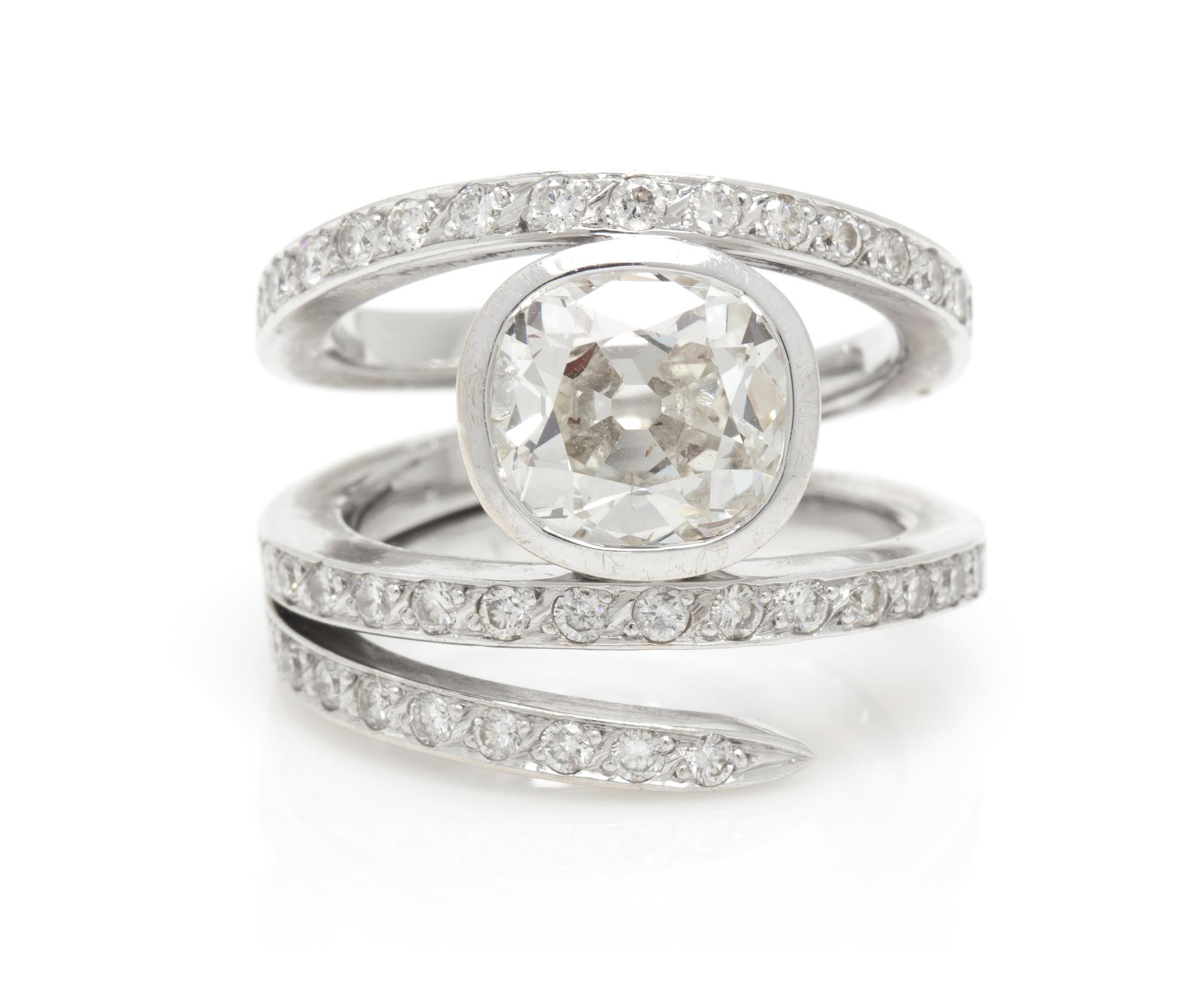 An 18 Karat White Gold and Diamond Ring, French, 10.00 dwts.