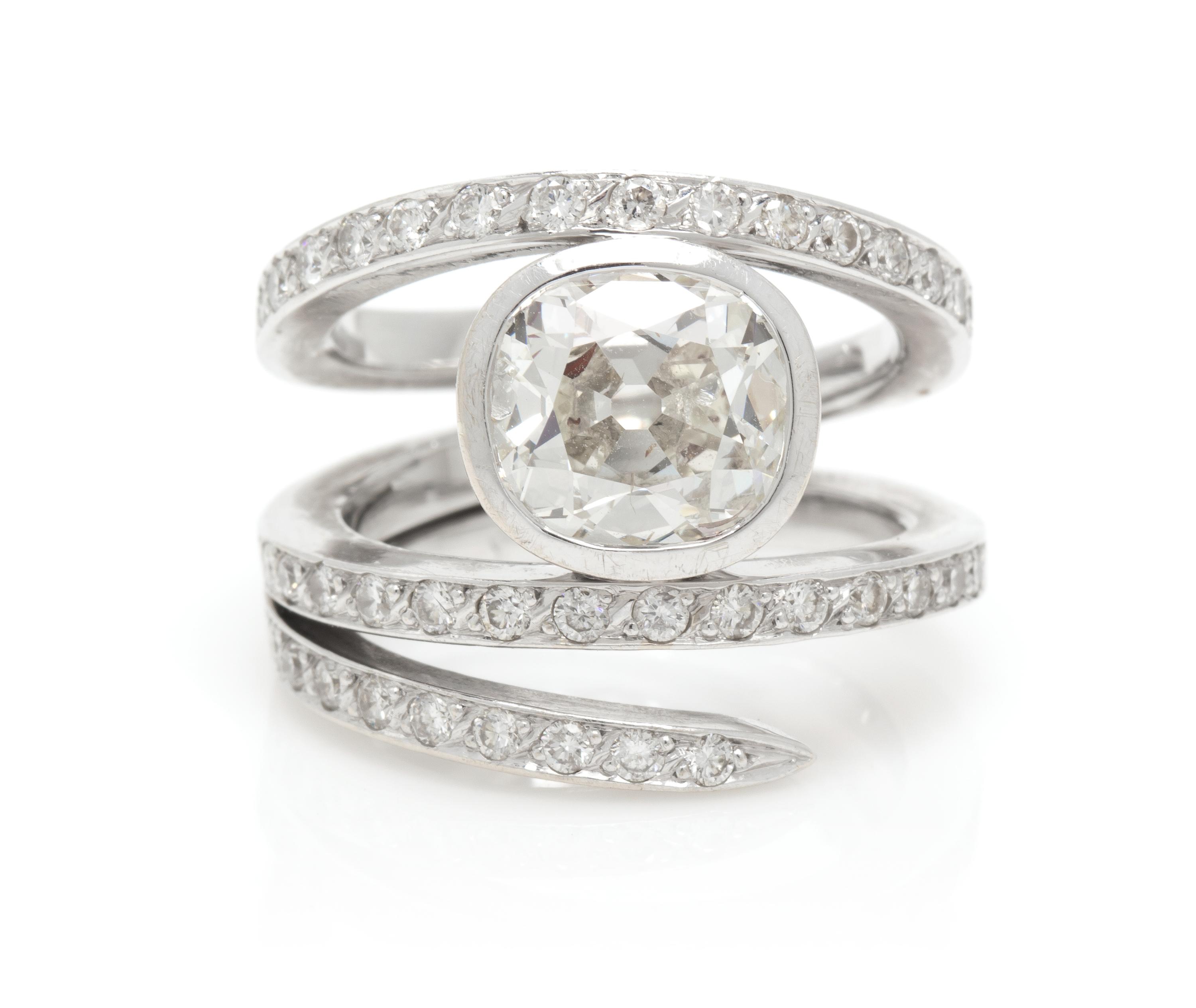 An 18 Karat White Gold and Diamond Ring, French, 10.00 dwts.