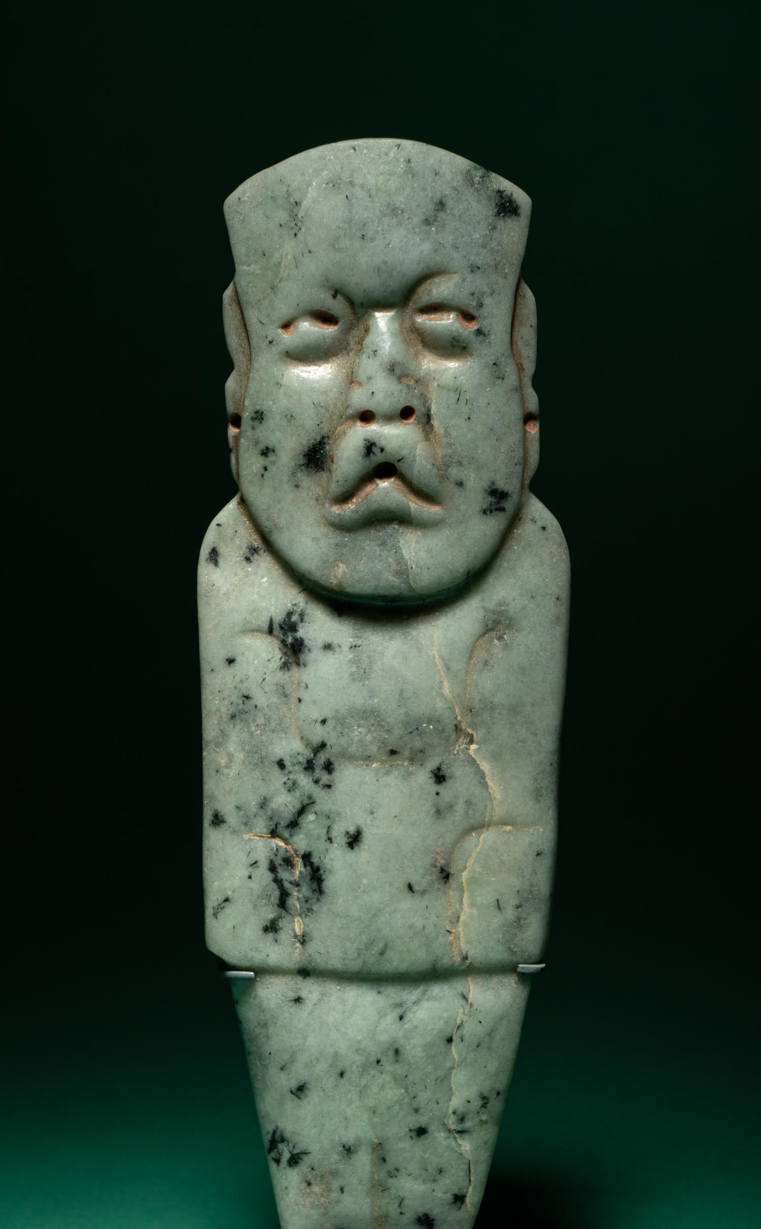 An Olmec Jade Figural Celt