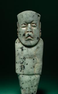 An Olmec Jade Figural Celt