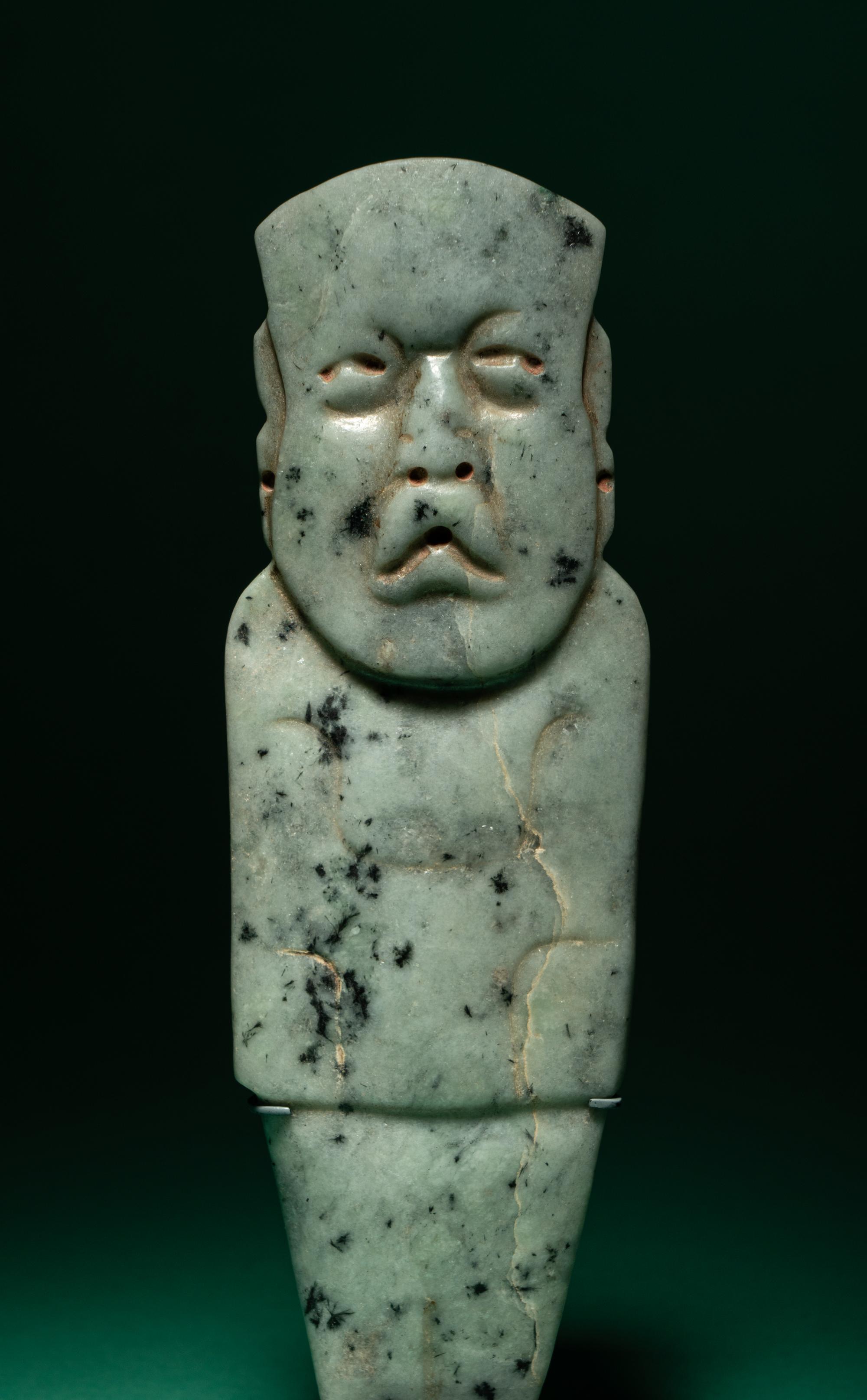An Olmec Jade Figural Celt