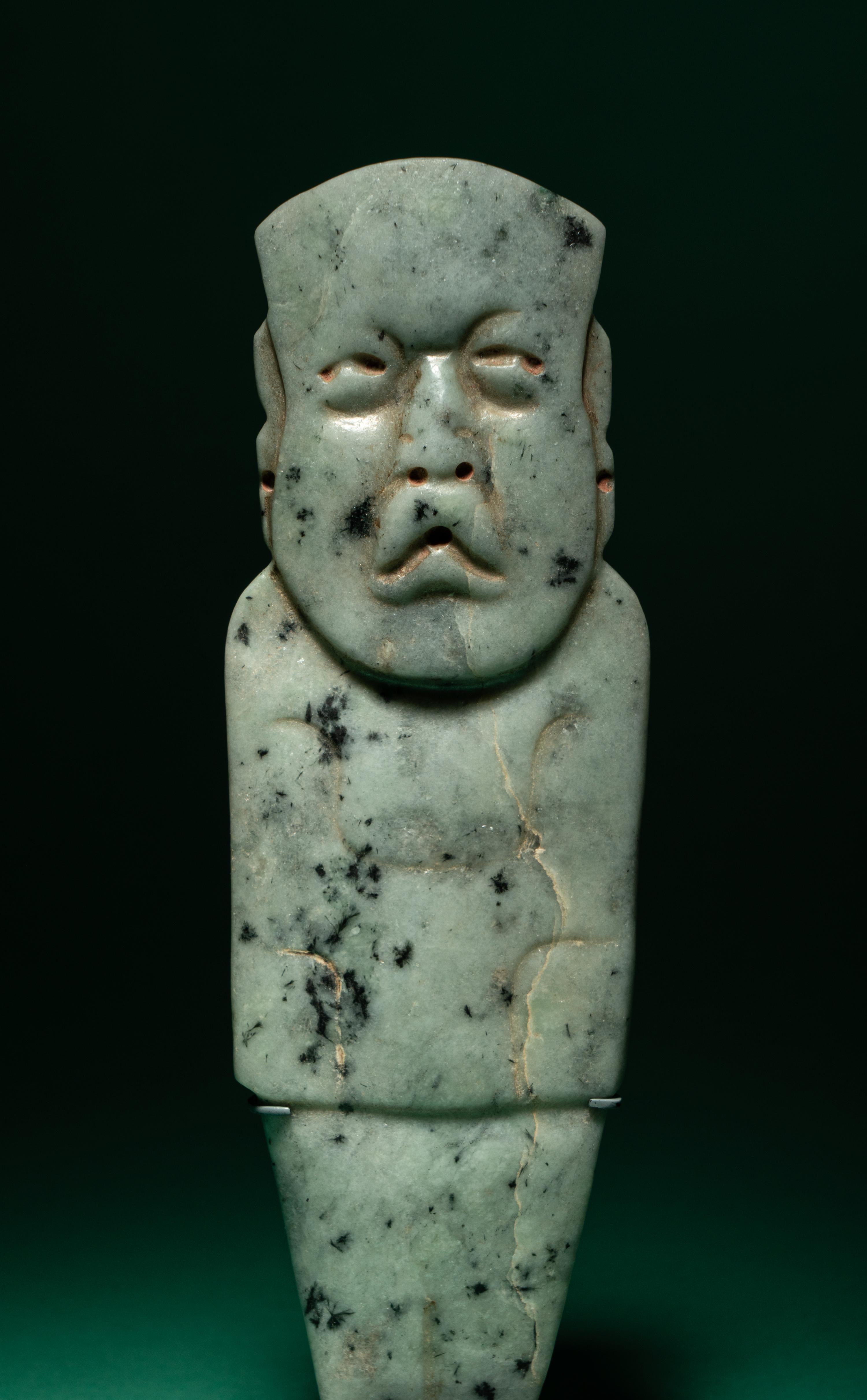 An Olmec Jade Figural Celt