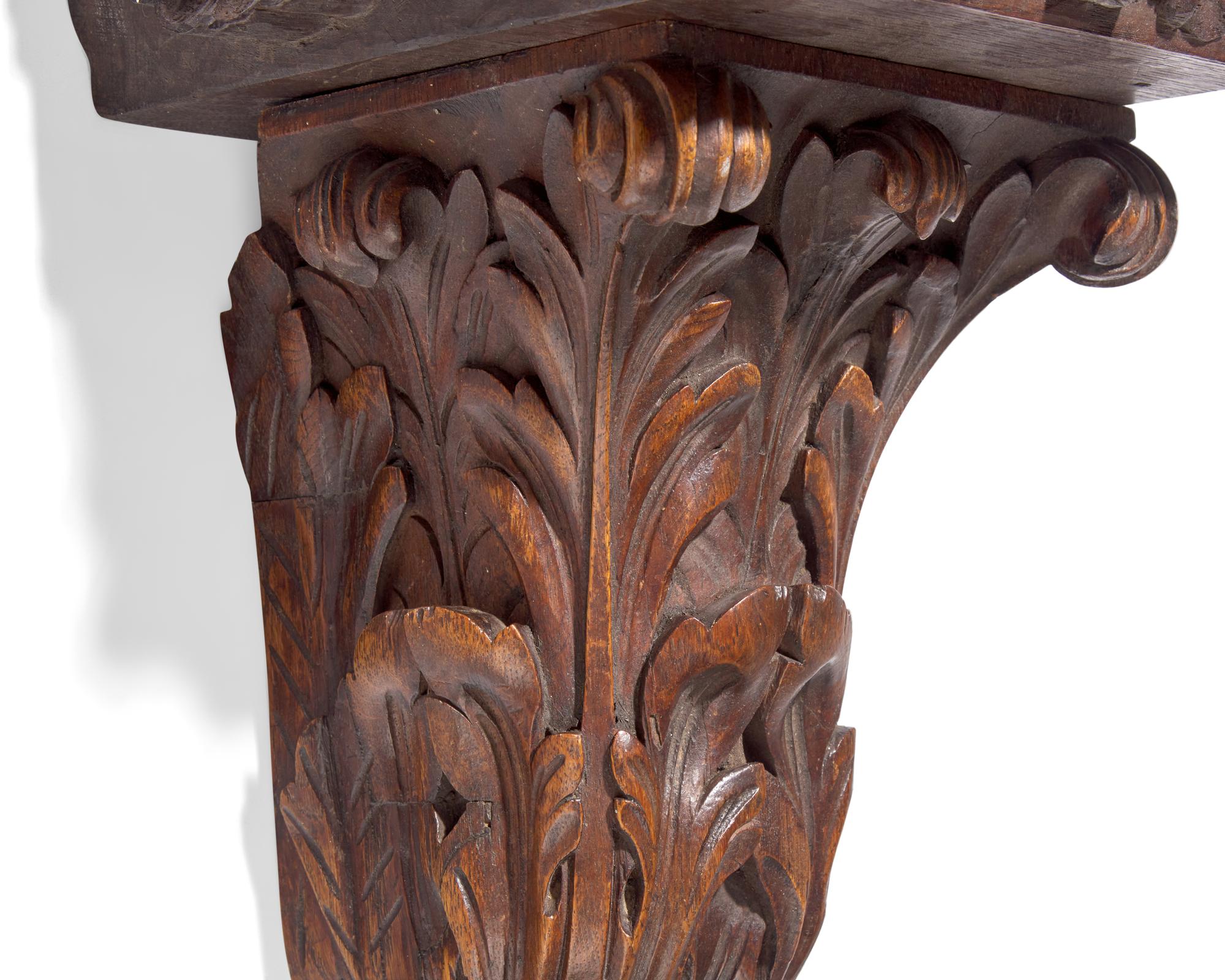 A French carved oak wall bracket and column capital, 18th / 19th century