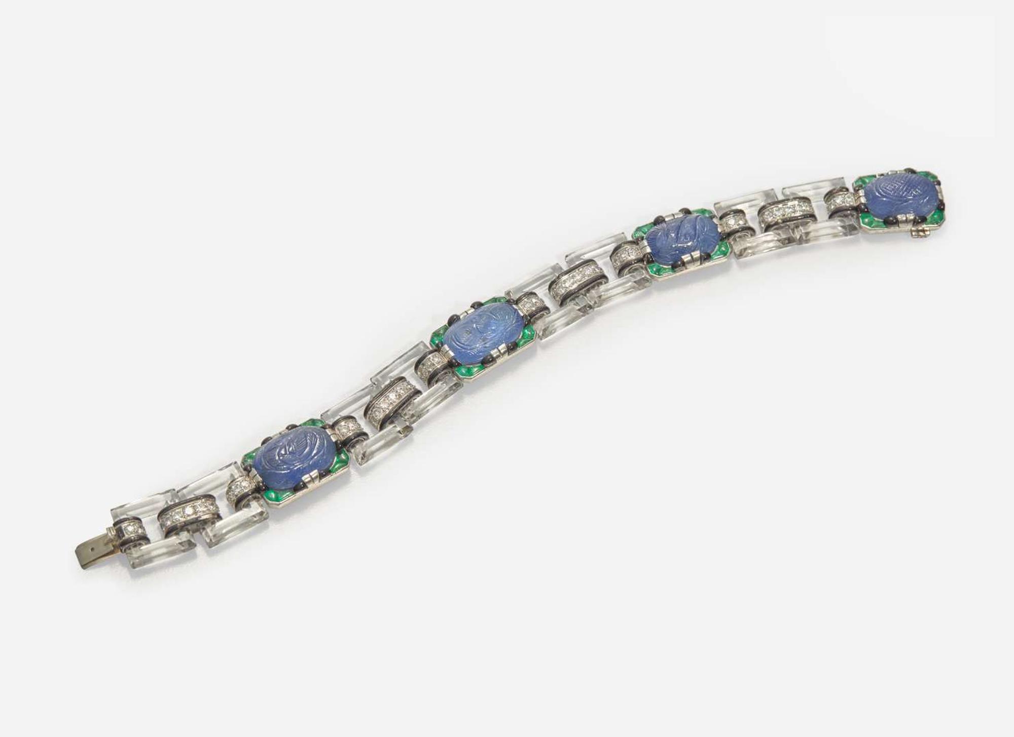 An 18K White Gold, Sapphire, Emerald, Diamond, and Enamel Art Deco Bracelet