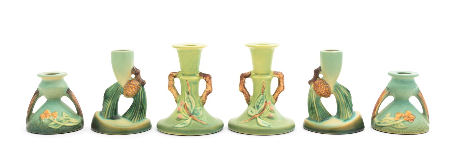Three Pairs of Roseville Candlesticks Height of tallest pair 4 3/4 inches.