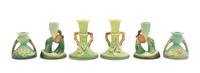 Three Pairs of Roseville Candlesticks Height of tallest pair 4 3/4 inches.