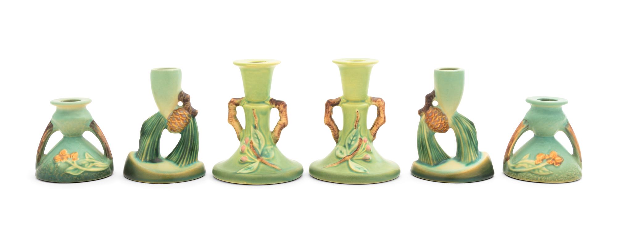 Three Pairs of Roseville Candlesticks Height of tallest pair 4 3/4 inches.