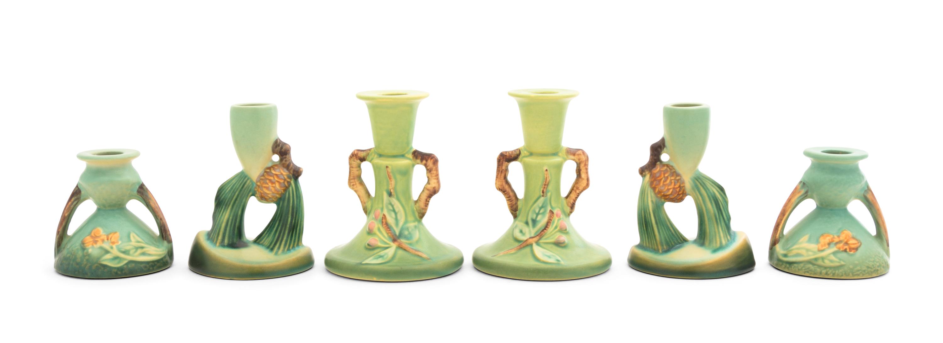 Three Pairs of Roseville Candlesticks Height of tallest pair 4 3/4 inches.