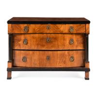 A Biedermeier Part-Ebonized Pearwood Commode