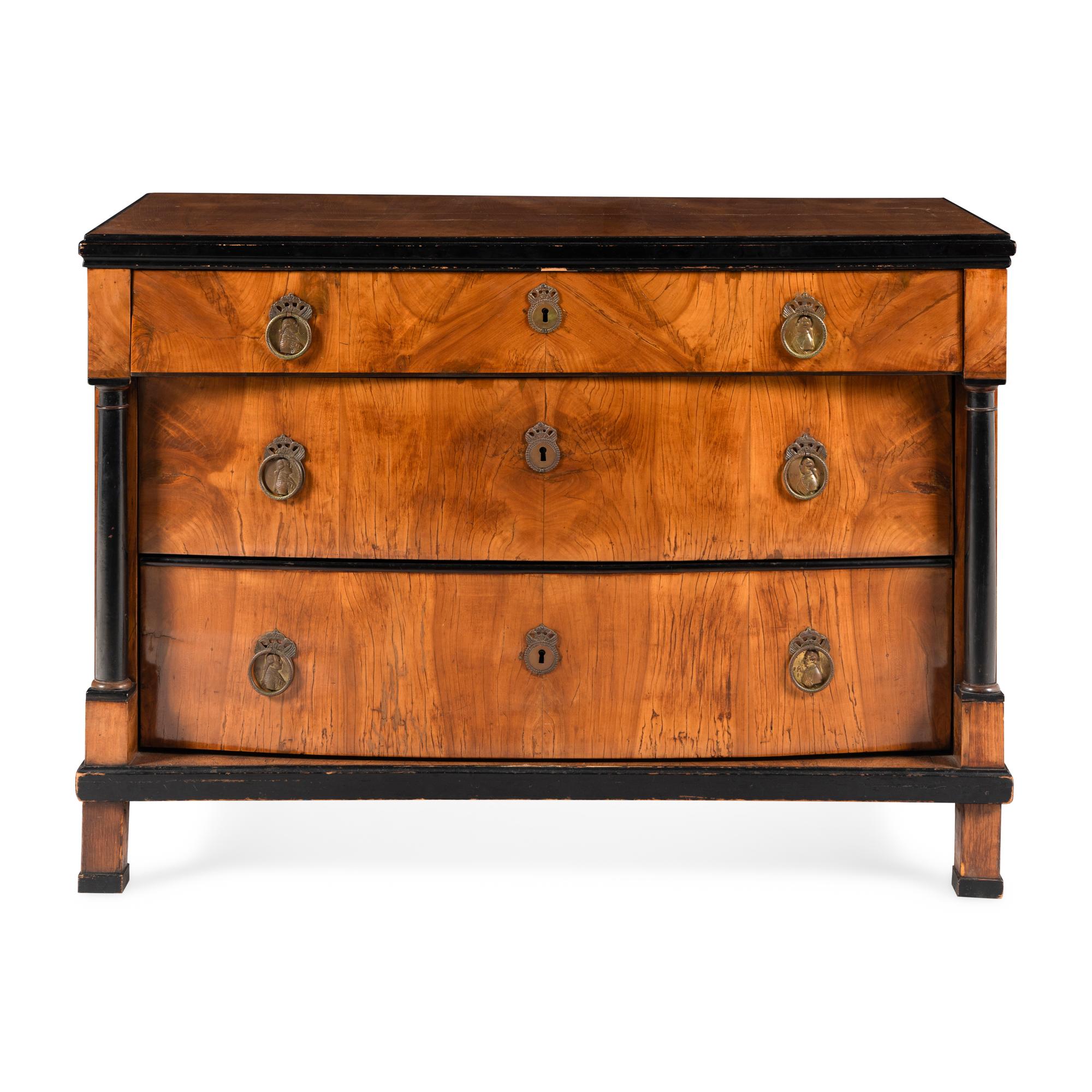 A Biedermeier Part-Ebonized Pearwood Commode