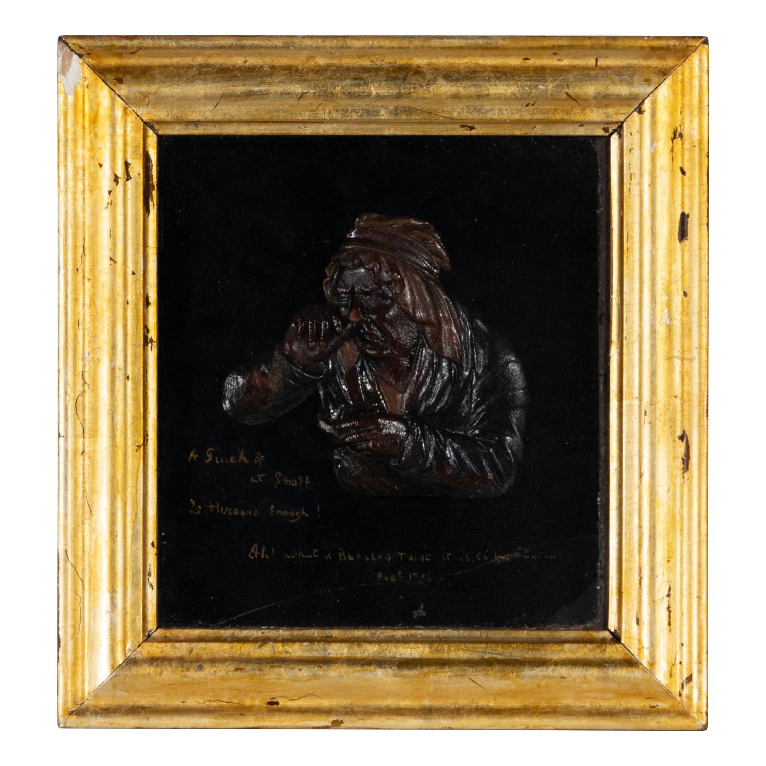 A Pair of Tobacco Themed Wax Portrait Profiles