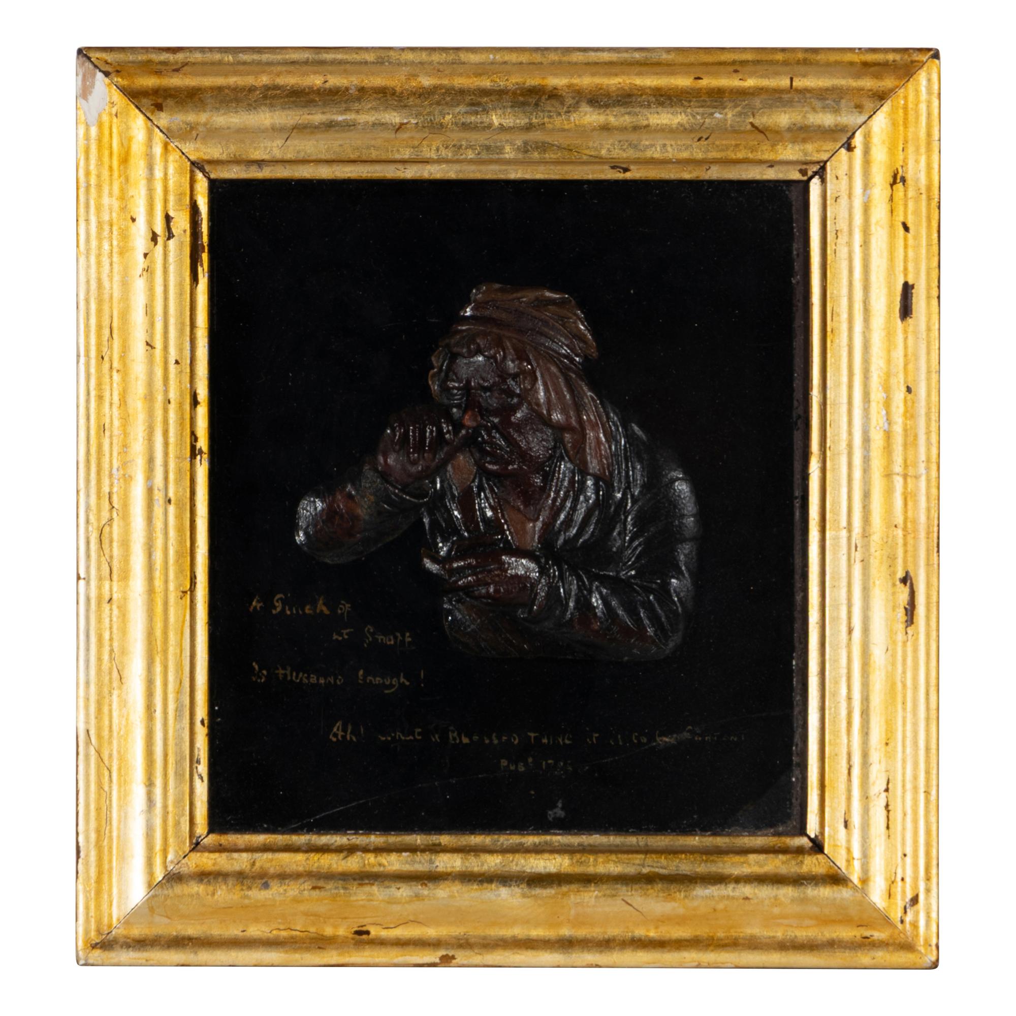 A Pair of Tobacco Themed Wax Portrait Profiles