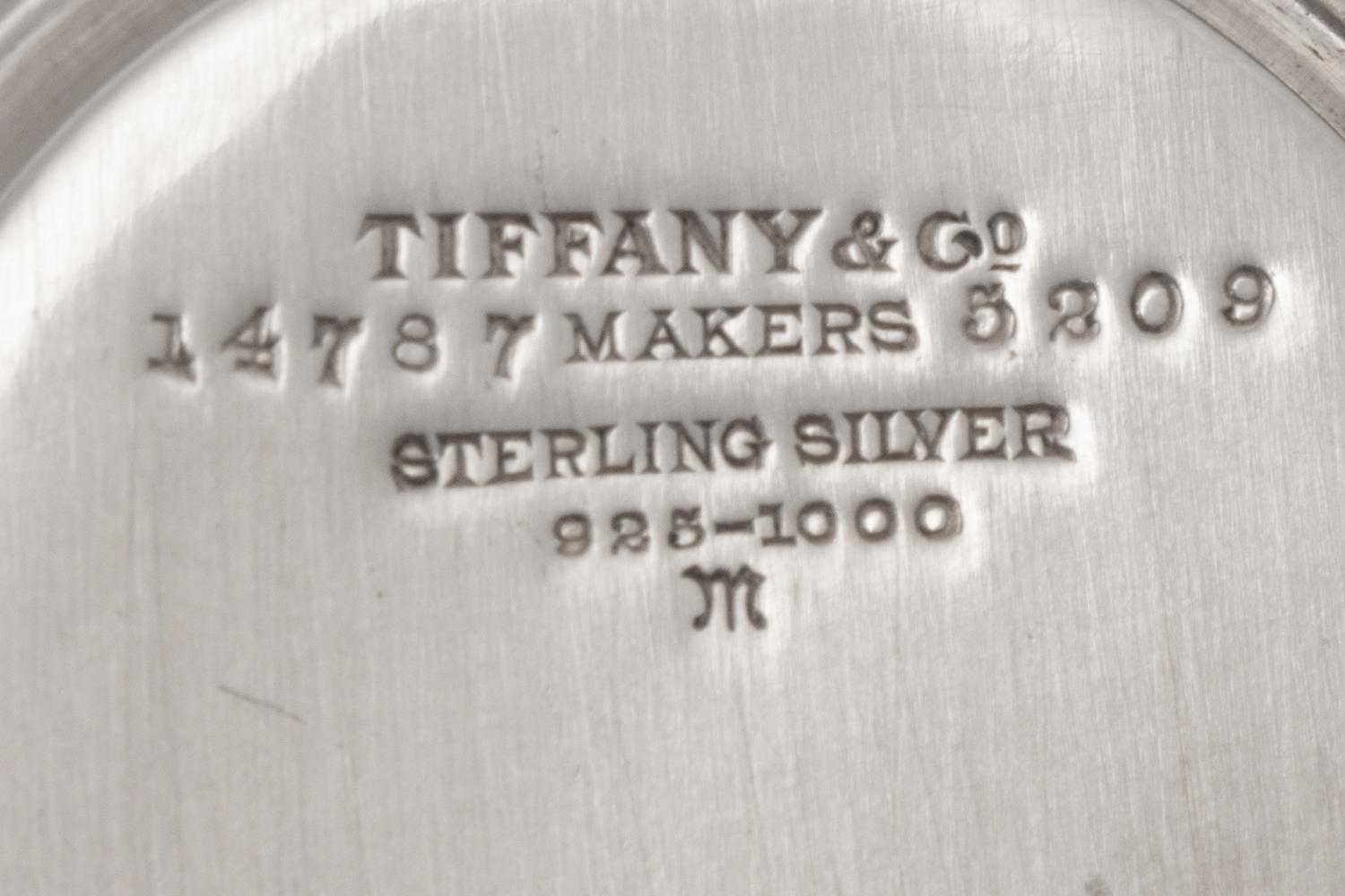 A Set of Twelve Tiffany and Co. Silver Coffee Cups and Saucers