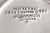 A Set of Twelve Tiffany and Co. Silver Coffee Cups and Saucers
