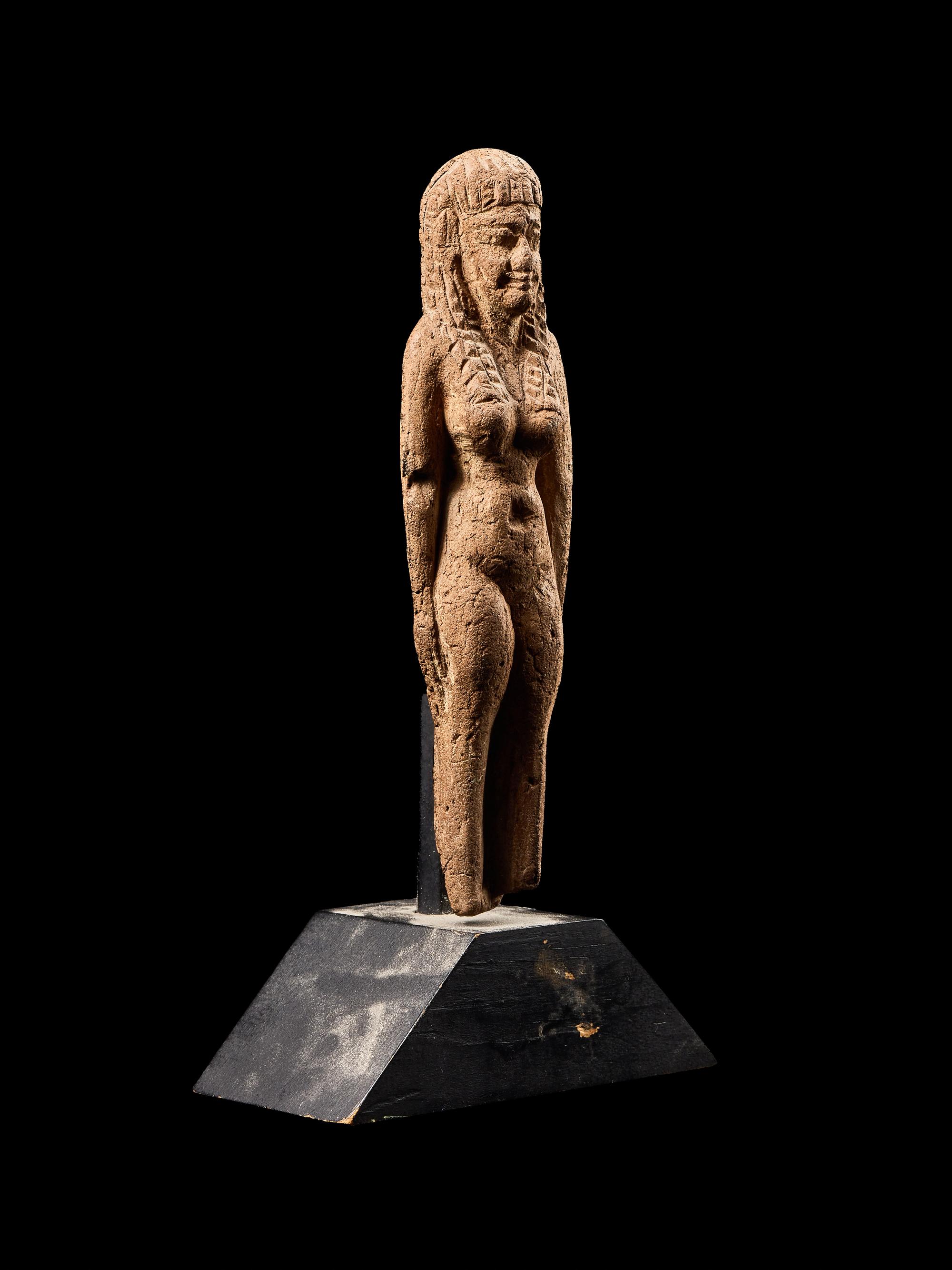 An Egyptian Terracotta Female Figure