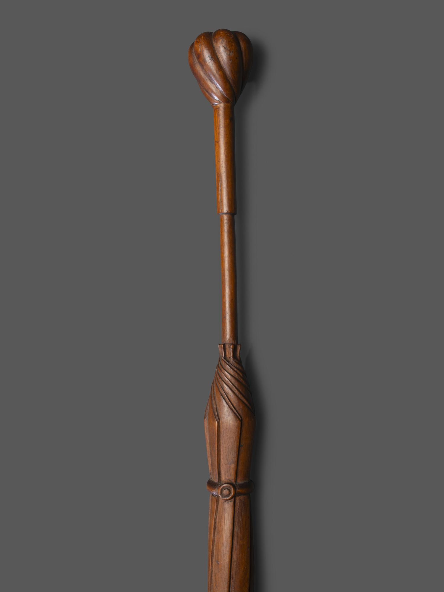 A Folk Art Carved Wood Umbrella Form Cane