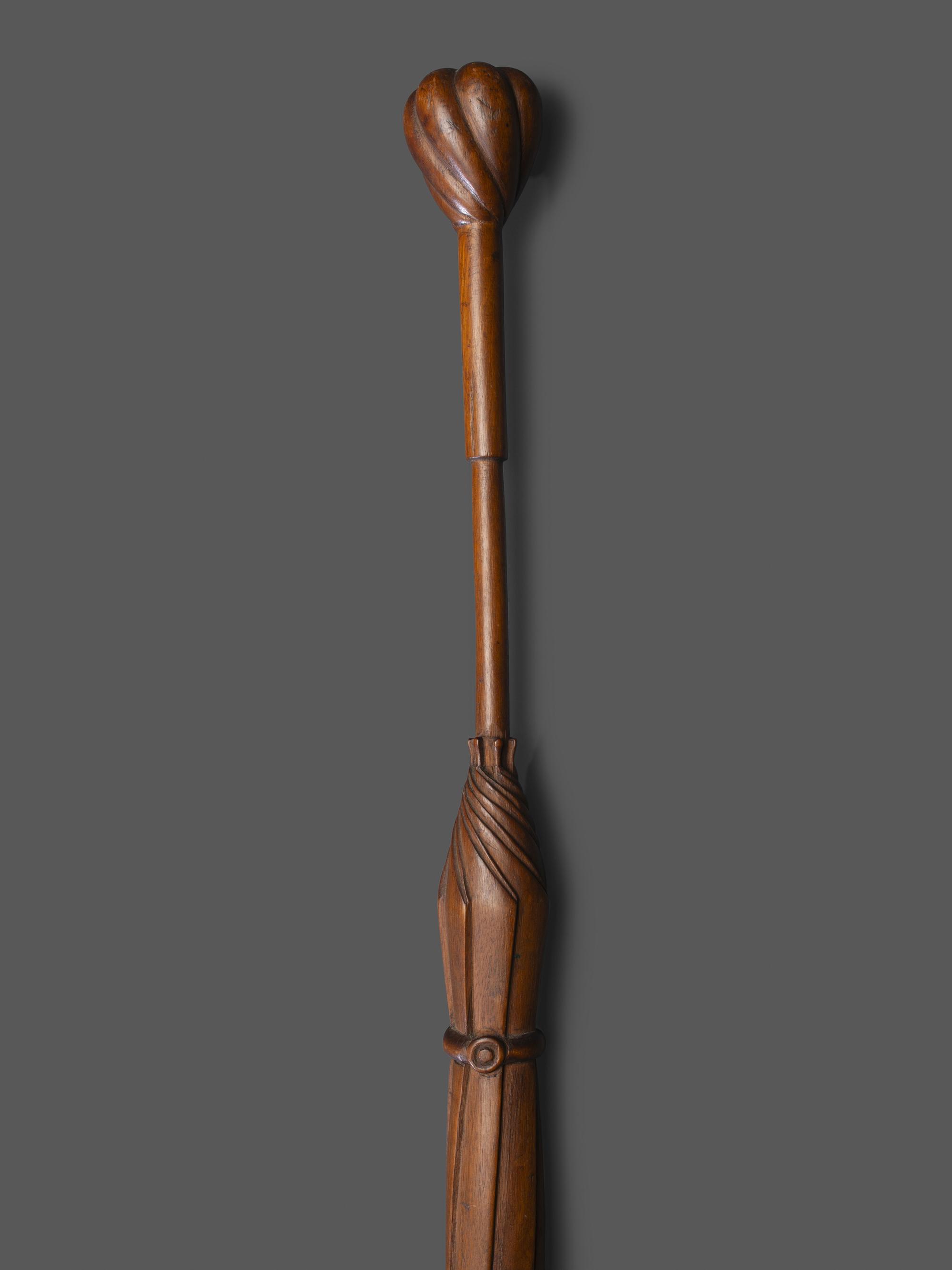A Folk Art Carved Wood Umbrella Form Cane