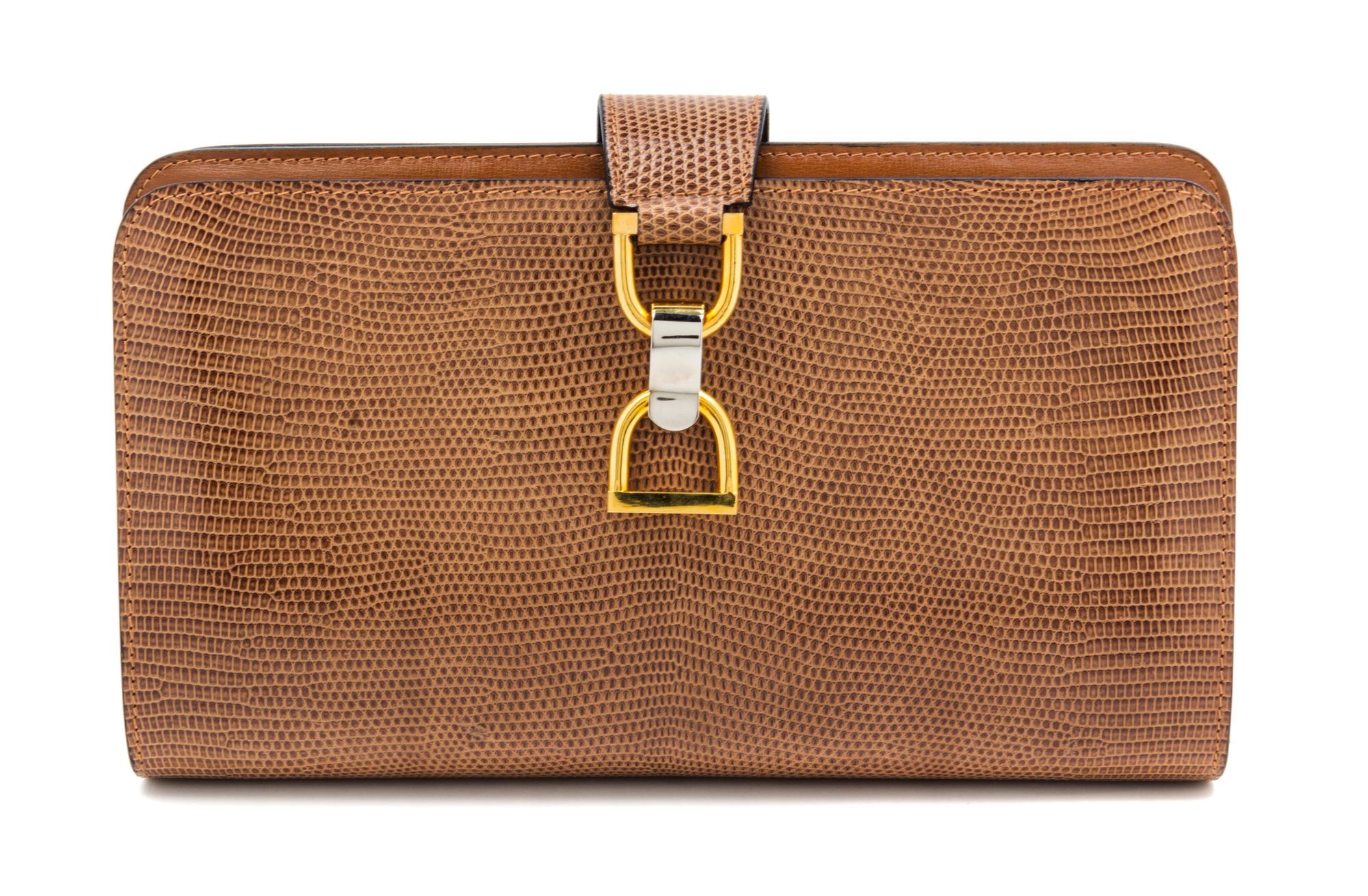 A Gucci Brown Skin Clutch, 10" x 6" x 1.5".