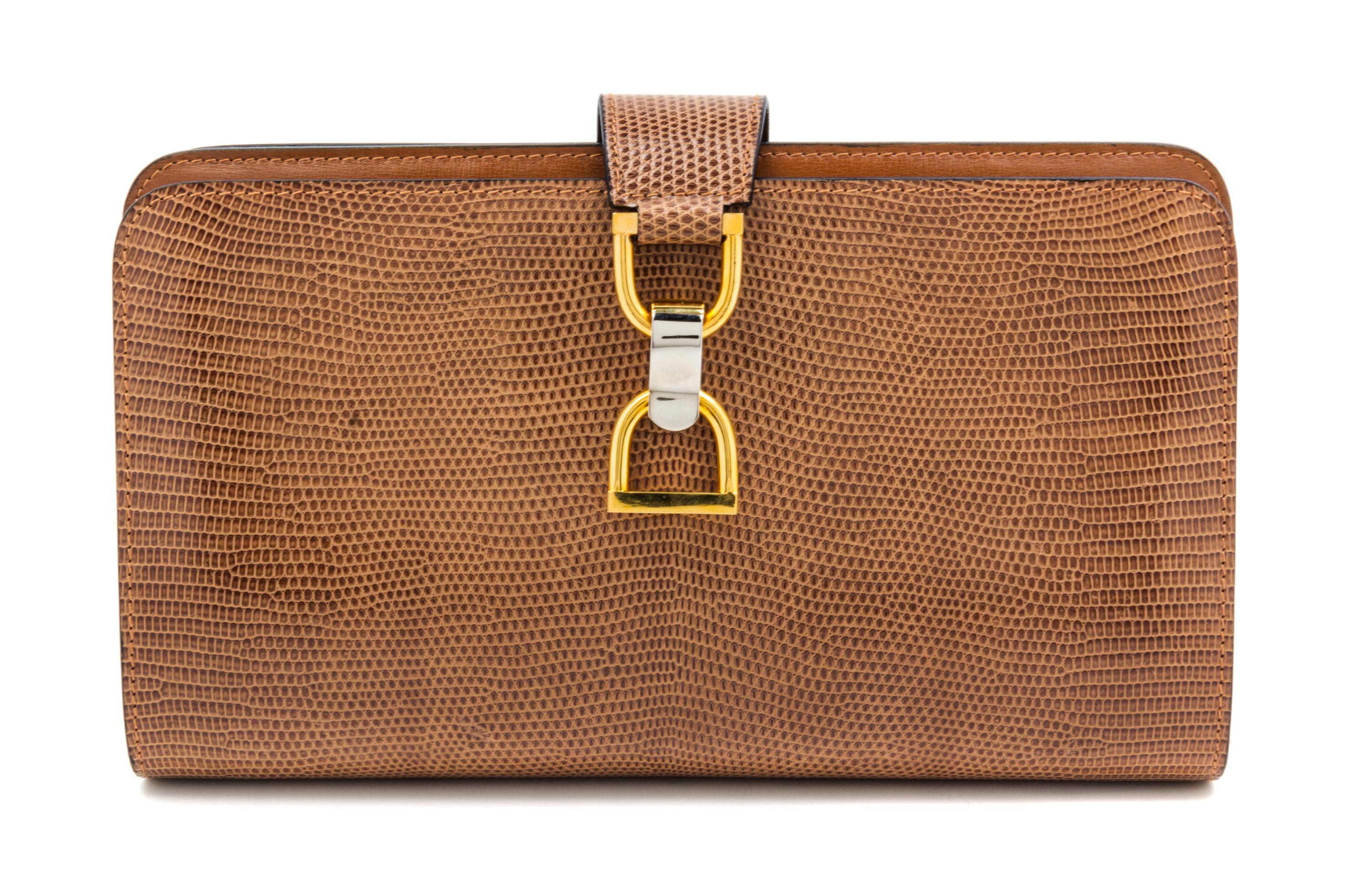 A Gucci Brown Skin Clutch, 10" x 6" x 1.5".