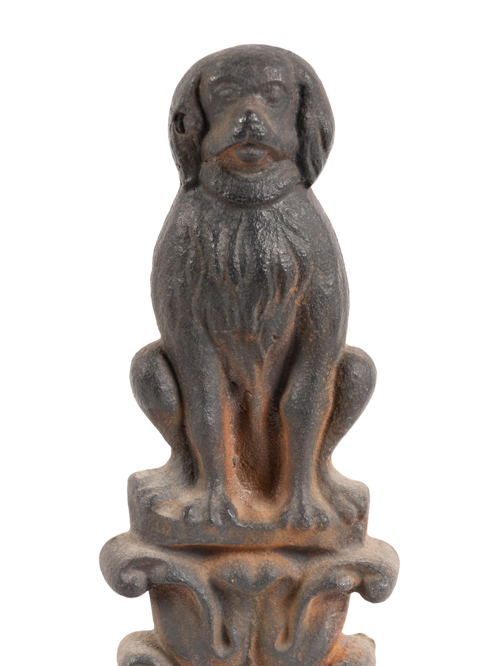 A Pair of Cast-Iron Dog Form Andirons