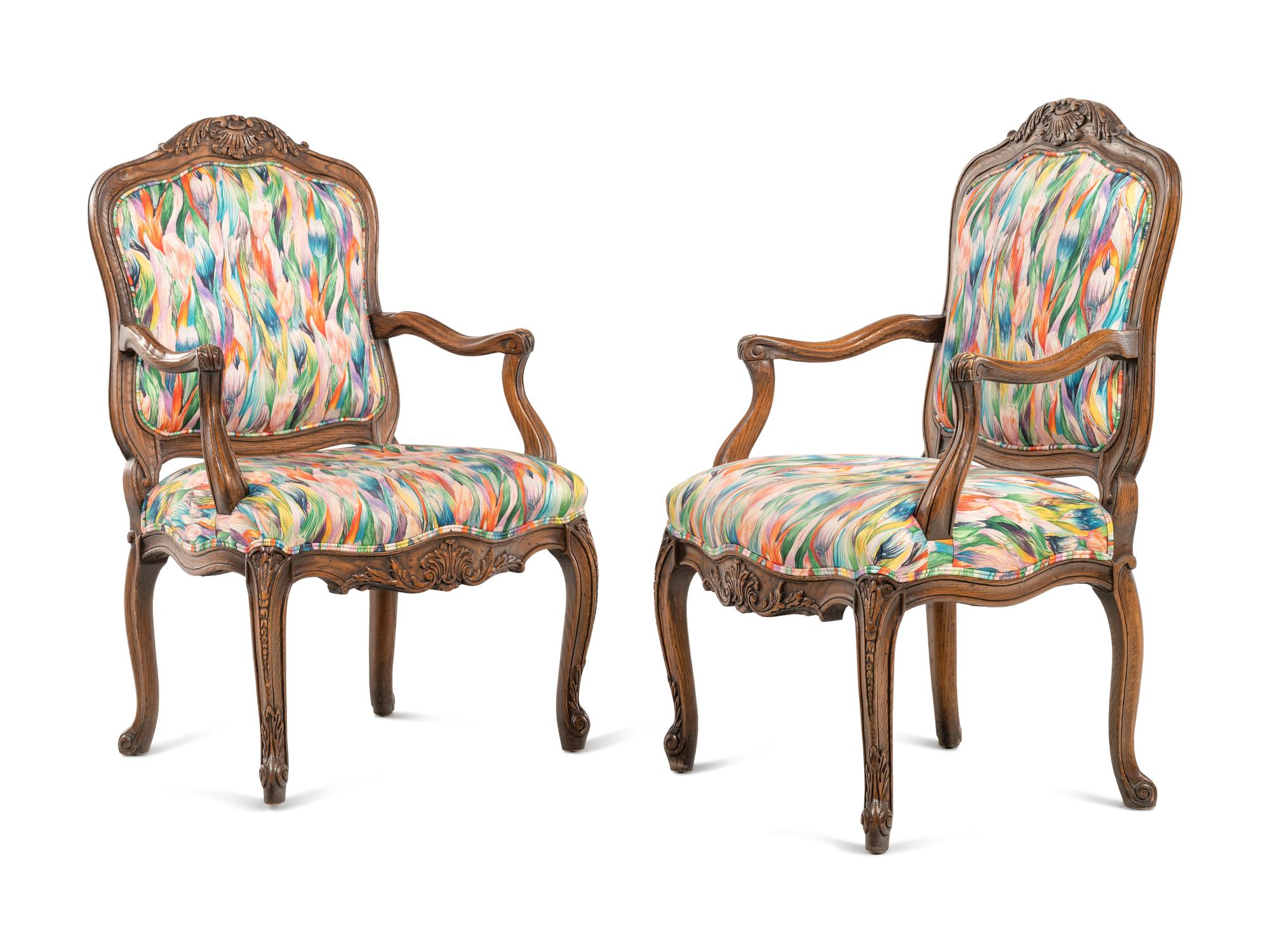 A Set of Four Interior Crafts Louis XV Style Oak Fauteuils