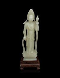 A Pale Celadon Jade Figure of Standing Guanyin