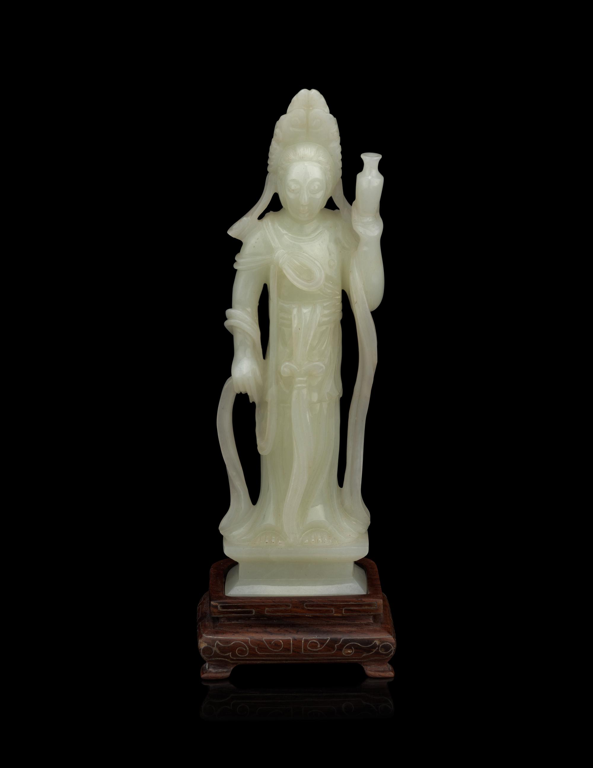 A Pale Celadon Jade Figure of Standing Guanyin