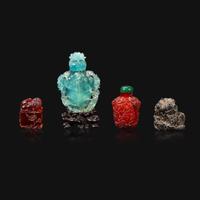 A Chinese carved aquamarine snuff bottle, an amber lion-form seal, and an amber snuff bottle Qing Dynasty