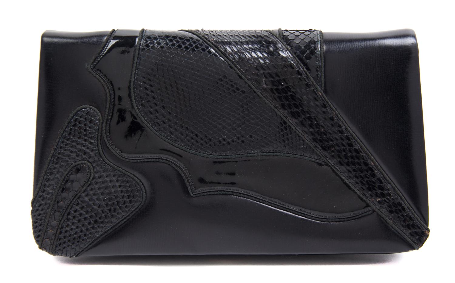 A Judith Leiber Black Leather Clutch, 8.5" x 5" x 1".