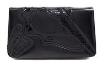 A Judith Leiber Black Leather Clutch, 8.5" x 5" x 1".