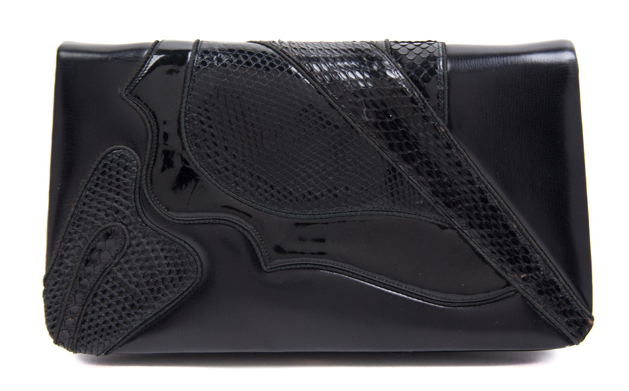 A Judith Leiber Black Leather Clutch, 8.5" x 5" x 1".