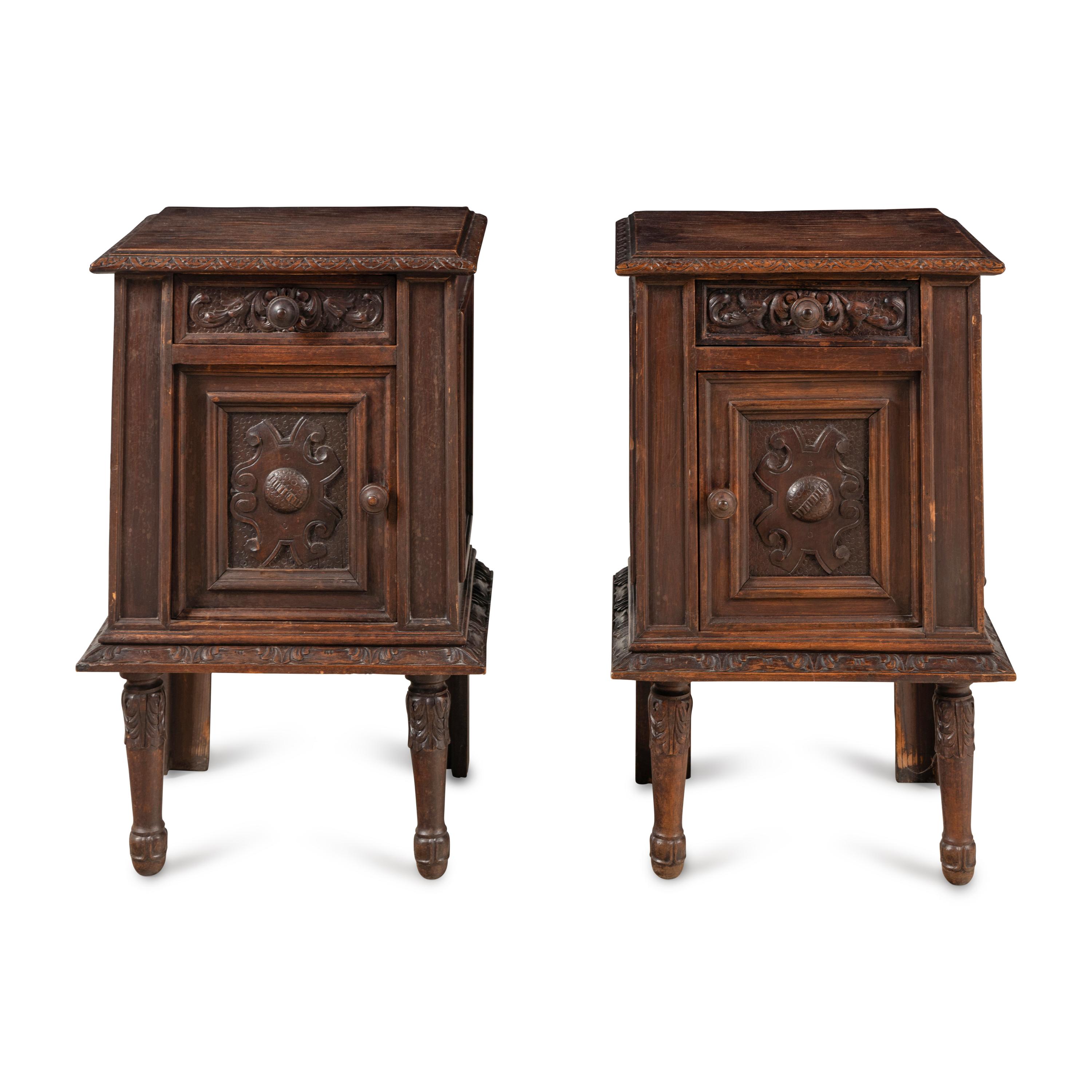 A Pair of Spanish Carved Oak Side Cabinets
