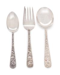 in the Repousse pattern, comprising: 4 dinner knives with blunt stainless steel blades 10 dinner knives with stainless steel blades 1 steak knife with stainless steel blade 1 cake server with stainless steel blade 15 iced tea spoons 3 tablespoons 8 soup spoons 1 ladle 7 butter spreaders 3 cocktail forks 4 demitasse spoons 8 salad forks 8 dinner forks 22 teaspoons 95 pieces total.