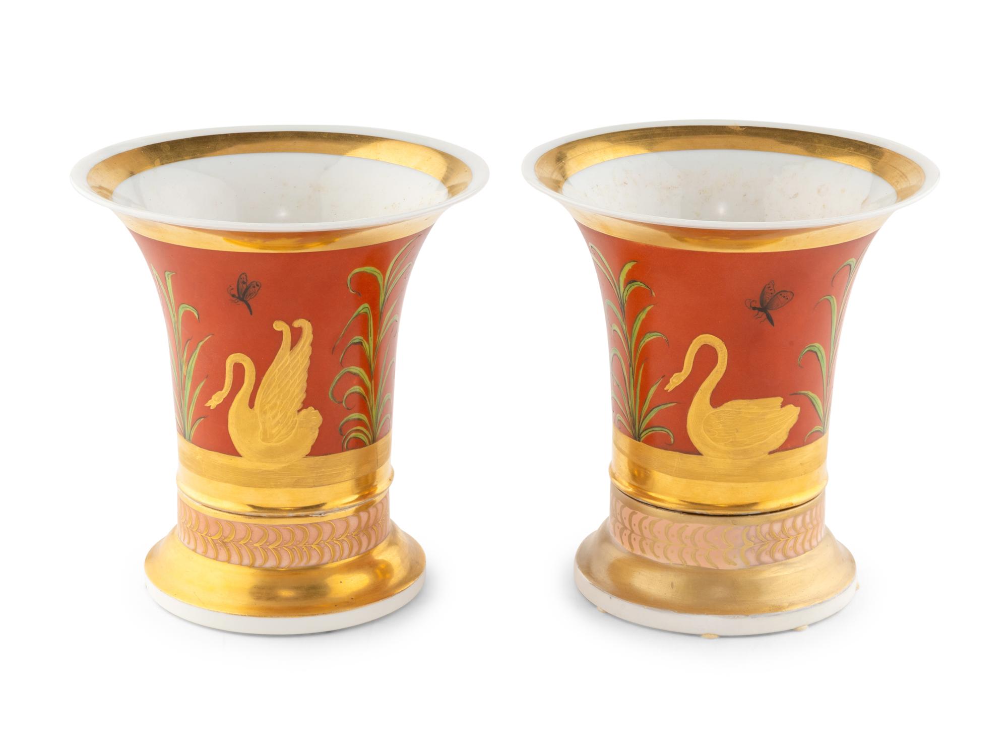 A Pair of Continental Parcel Gilt Porcelain Trumpet Vases
