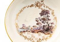A Near Pair of South Italian Porcelain Teacups and Saucers