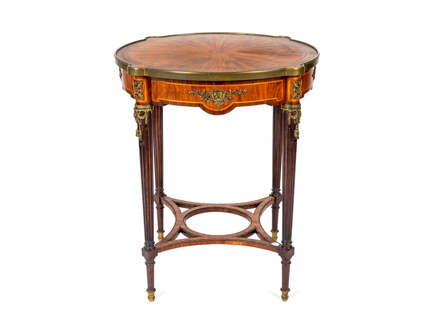 A Louis XVI Style Gilt-Bronze-Mounted Mahogany Center Table — 20TH CENTURY