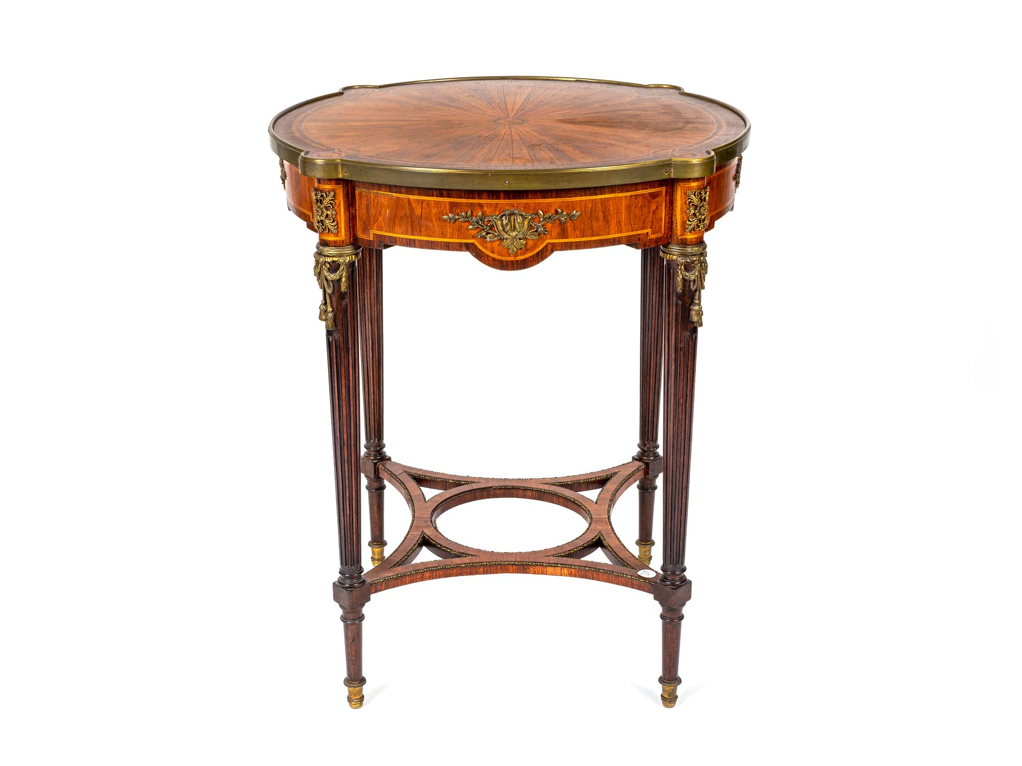 A Louis XVI Style Gilt-Bronze-Mounted Mahogany Center Table — 20TH CENTURY
