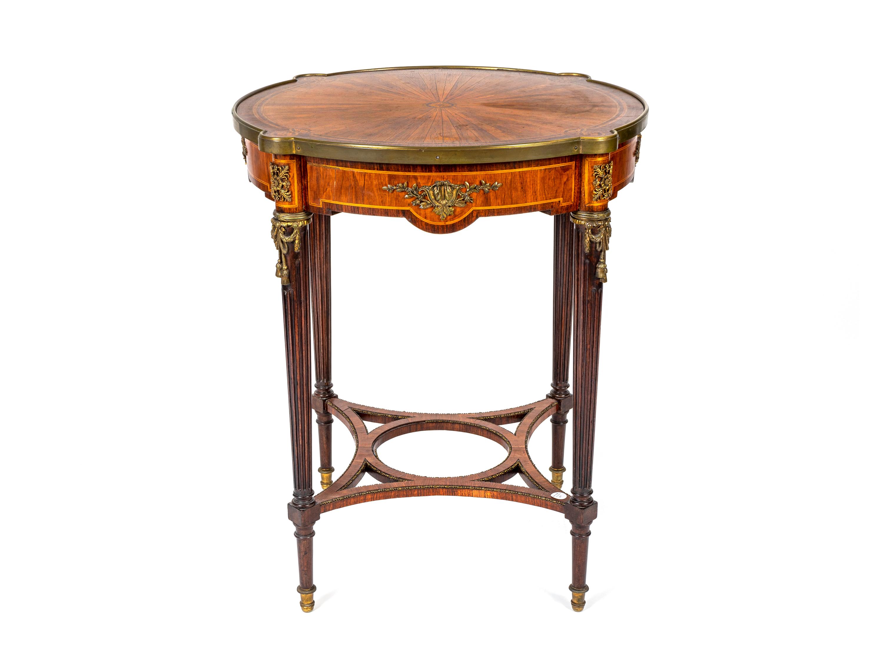 A Louis XVI Style Gilt-Bronze-Mounted Mahogany Center Table — 20TH CENTURY